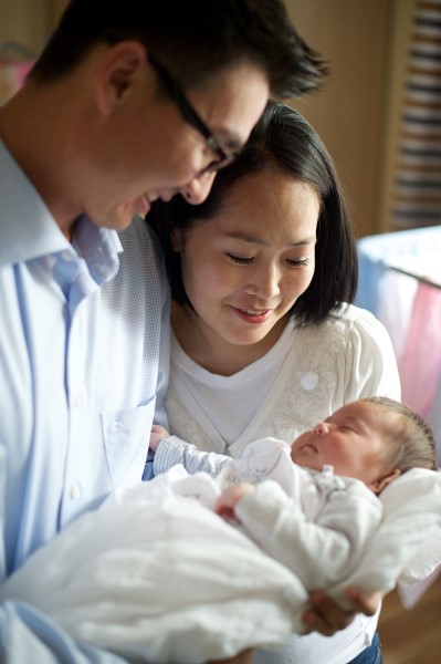 image of parents with a baby